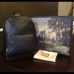 Gucci black leather backpack